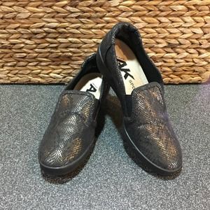 Anne Klein Black and Gold Flats